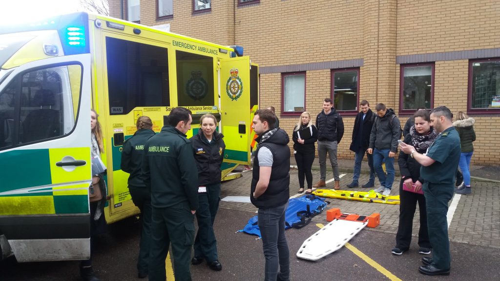 Young people with paramedics